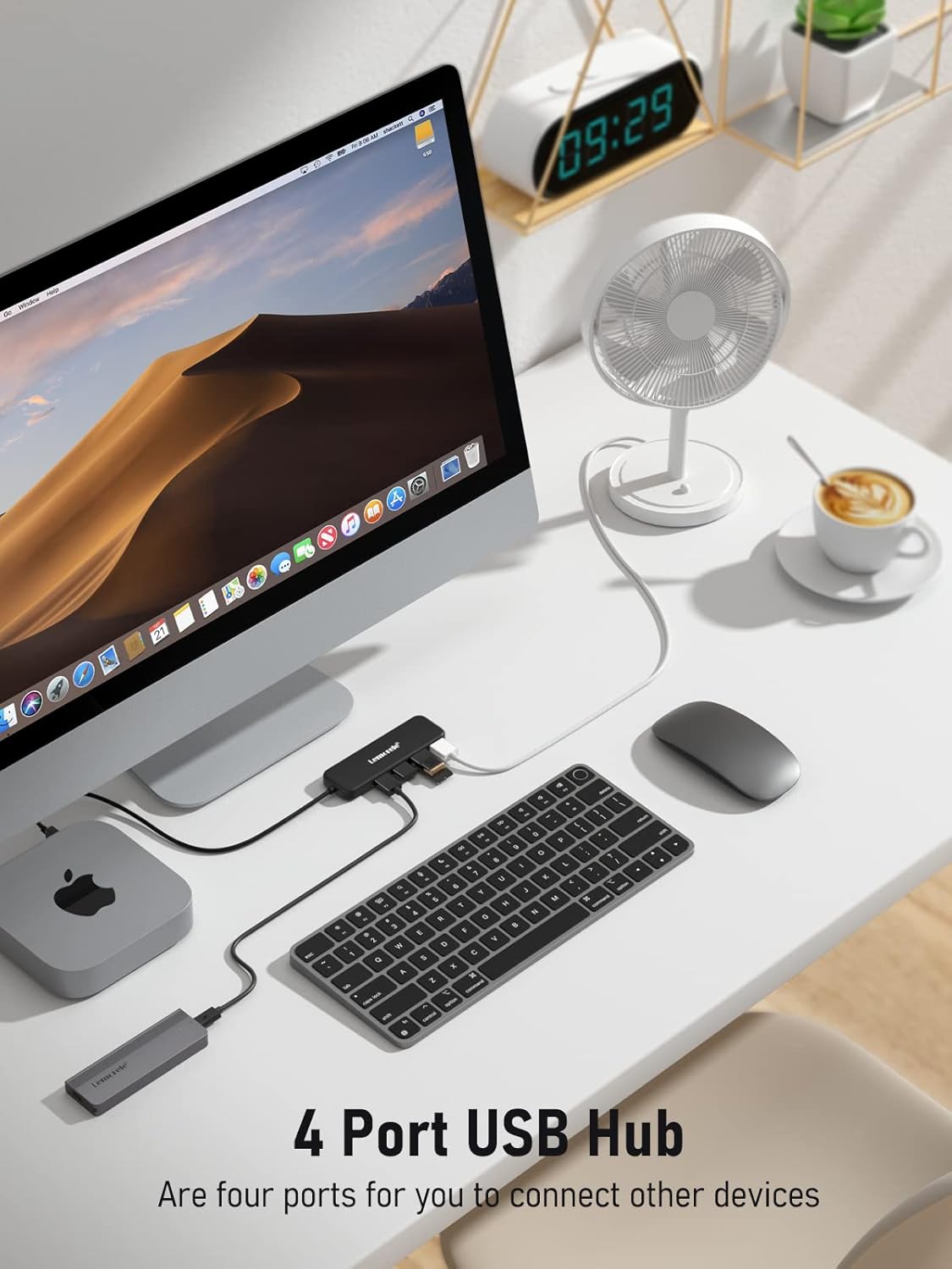 Desk setup with a computer monitor, keyboard, mouse, and 4-port USB hub.