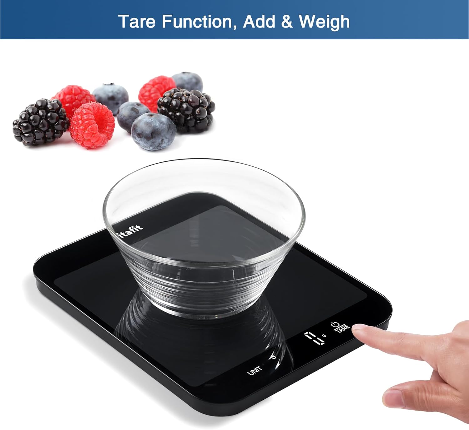 Digital kitchen scale with a glass of water on it, surrounded by berries, with text indicating tare function, add, and weigh features.