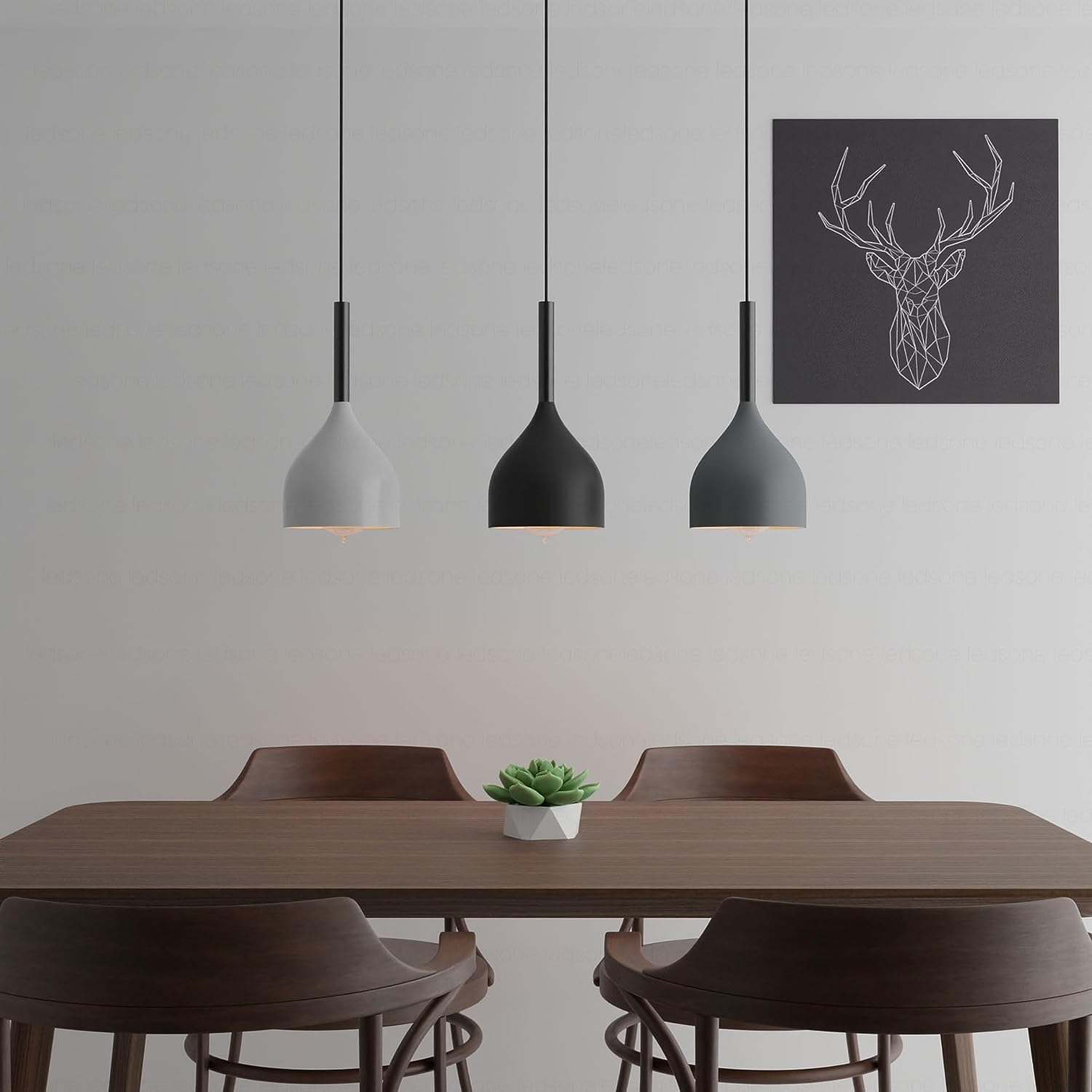 Dining room with a wooden table, chairs, and pendant lights on a gray wall with a deer head artwork.
