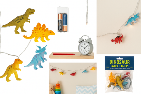 Dinosaur-themed fairy lights with packaging and clock on a white background