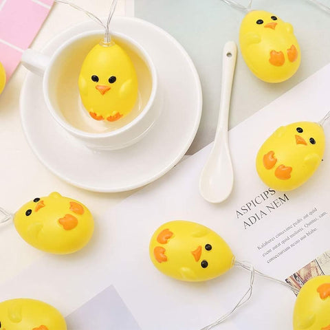 Easter chick fairy lights wrapped around garland for festive décor