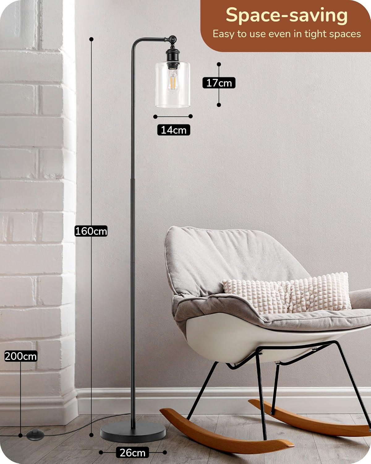 Floor lamp with measurements in a room setting, featuring a chair and white wall.