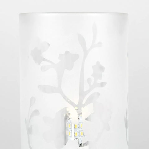 Floral Touch Table Lamp with chrome base and frosted glass shade.​

