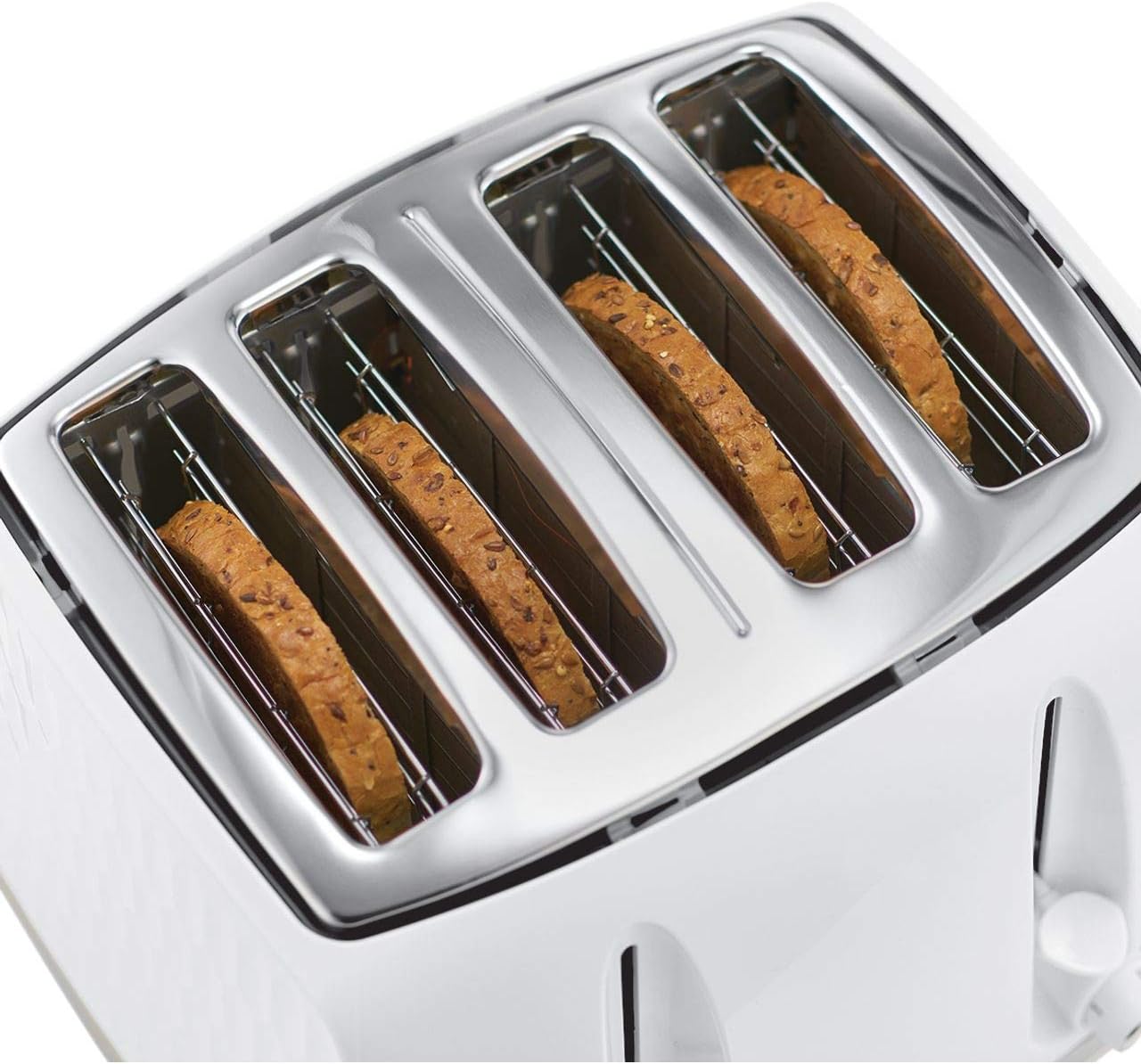 Four-slice toaster with bagels in the slots on a white background