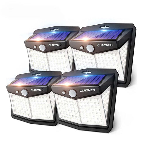 Four Claver solar-powered outdoor lights on a white background