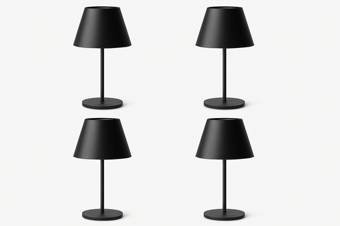 Four black table lamps on a white background