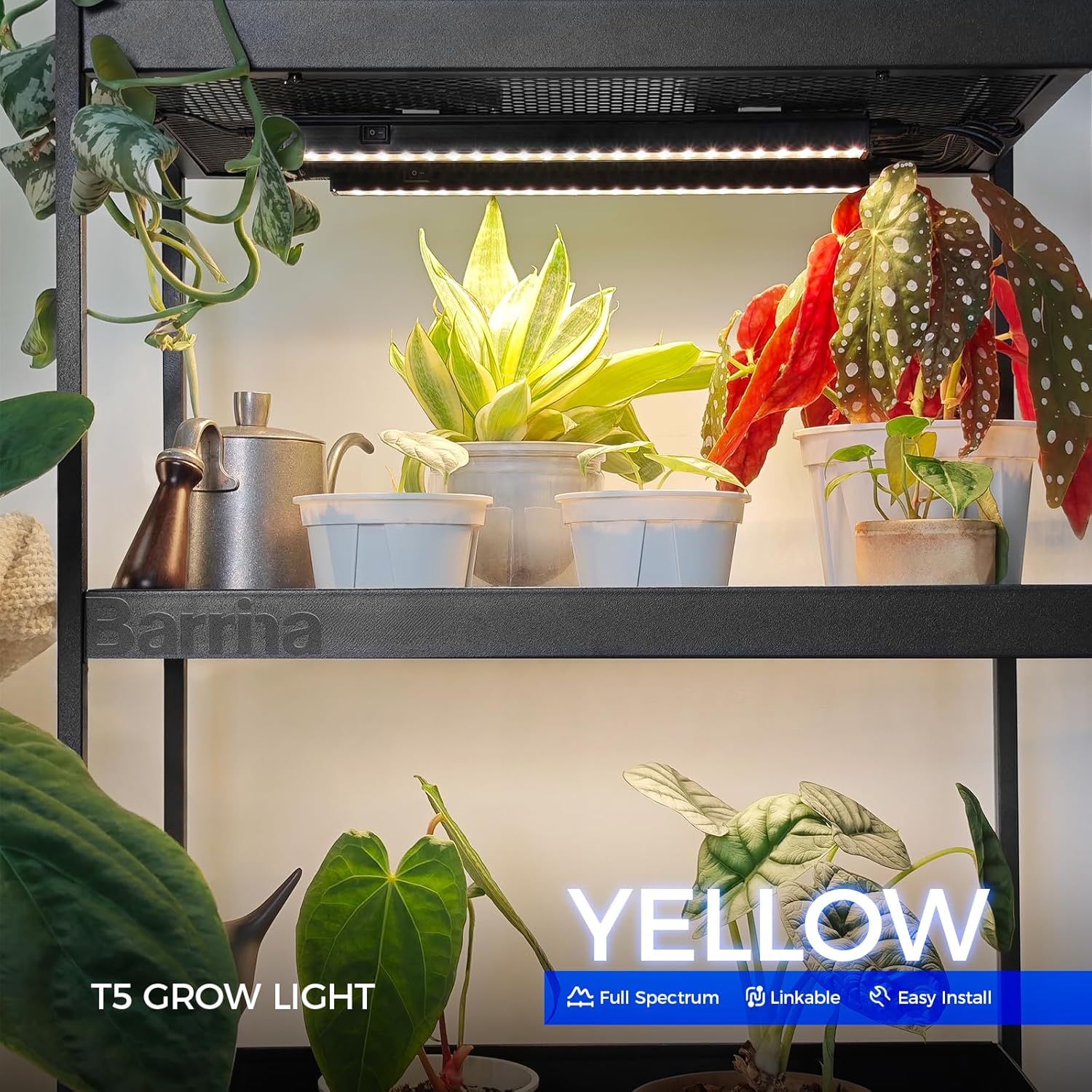 Gardening setup with plants under a Barrina T5 Grow Light, highlighting the light's yellow color.
