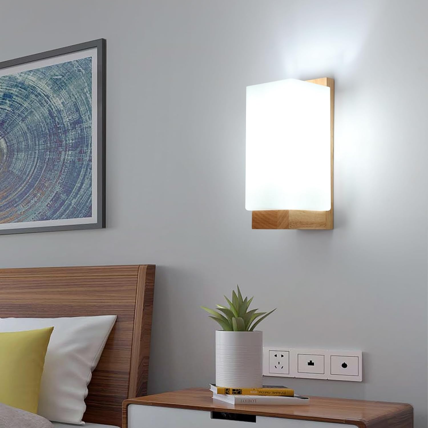 Glass and wood wall sconce with soft lighting

