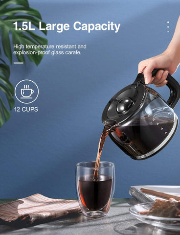 Glass carafe being filled with coffee on a table with a blue background