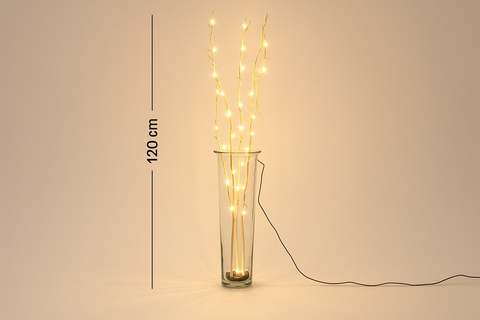 Glass vase with LED lights on a plain background