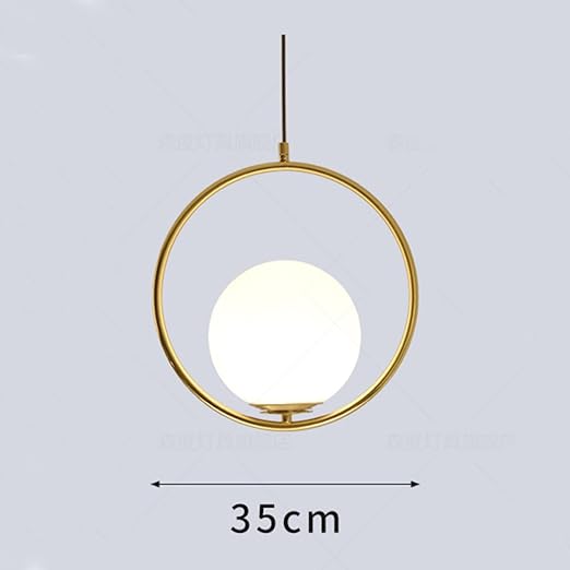 Gold pendant light with a white bulb on a gray background, showing dimensions.