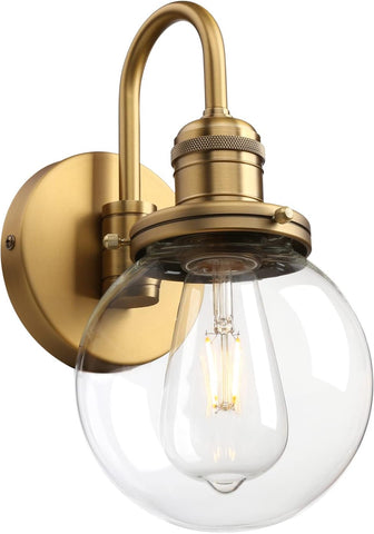 Gold wall-mounted light fixture with clear glass shade on a white background