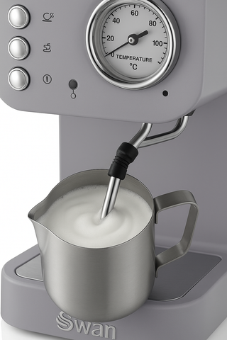 Gray Swan milk frother with a temperature gauge and milk pitcher on a white background