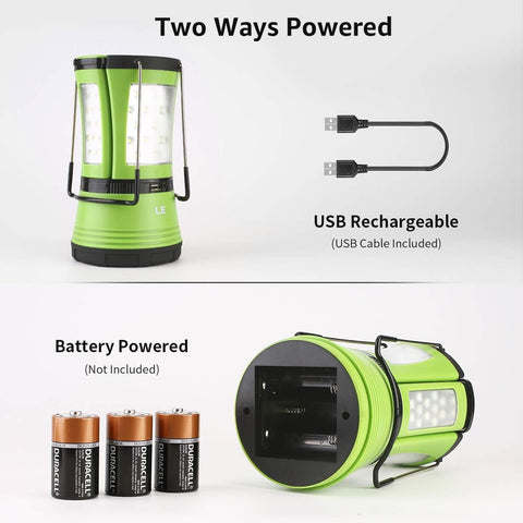 Green lantern with USB cable and batteries on a white background