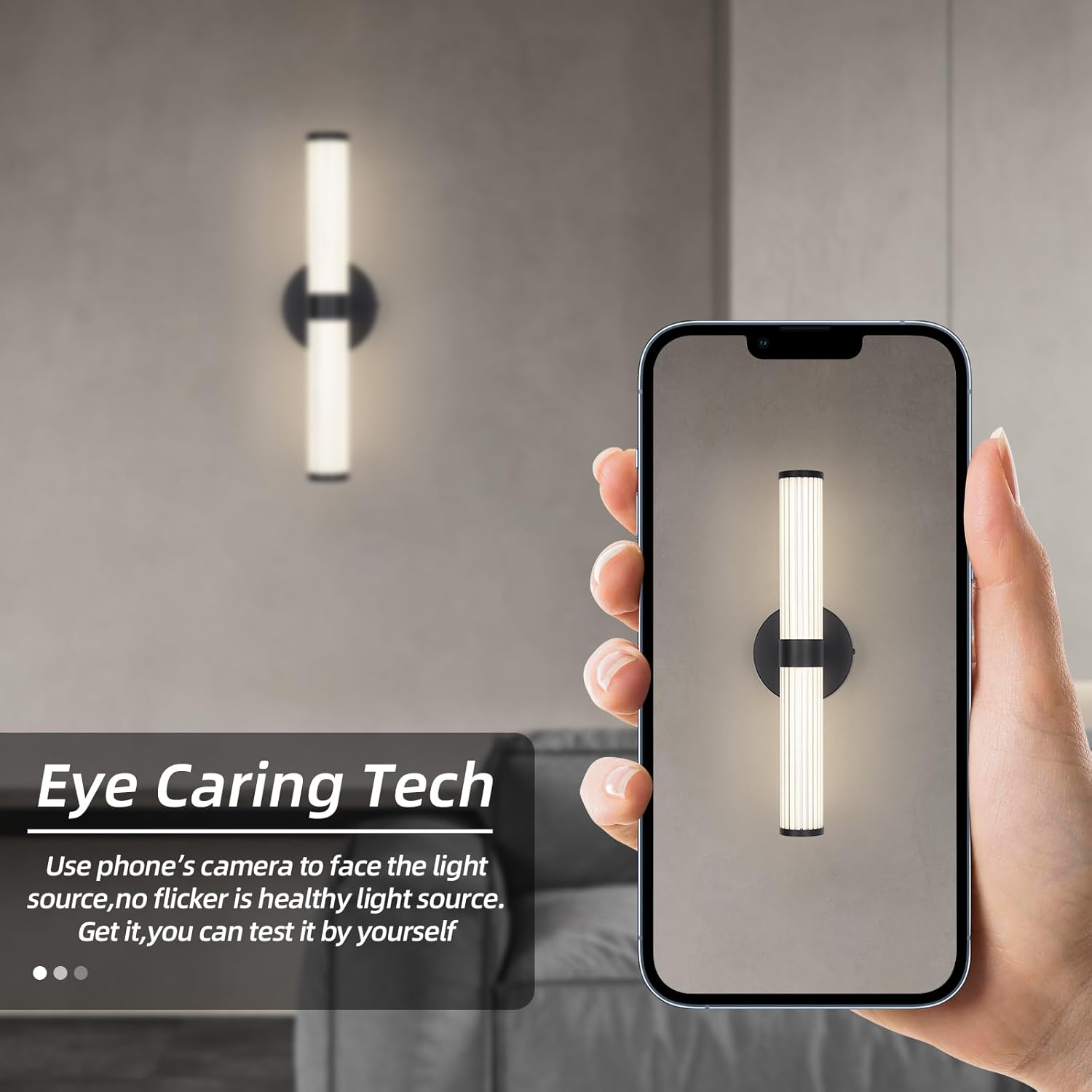 Hand holding a smartphone showing a light fixture on the screen with text about eye-caring technology.