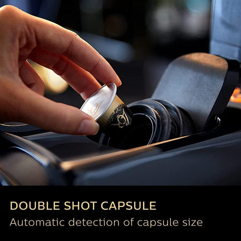 Hand inserting a double shot capsule into a coffee machine with text 'Double Shot Capsule' and 'Automatic detection of capsule size'.