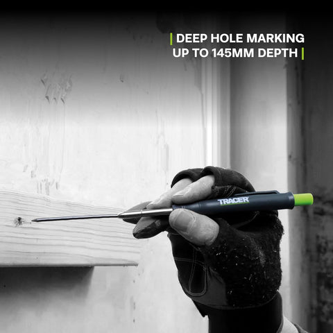 Hand using a Tracer deep hole marking tool on a wooden surface with text indicating depth capability.