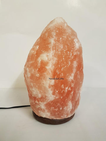 Himalayan salt lamp on a white background with 'Needs & Gifts' branding.