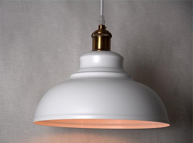 Vintage industrial pendant light hanging in a UK-style kitchen

