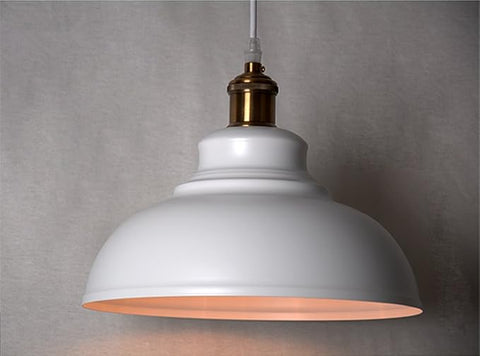 Vintage industrial pendant light hanging in a UK-style kitchen

