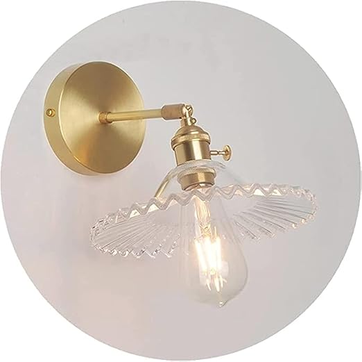 Vintage-inspired wall light complementing a minimalist décor