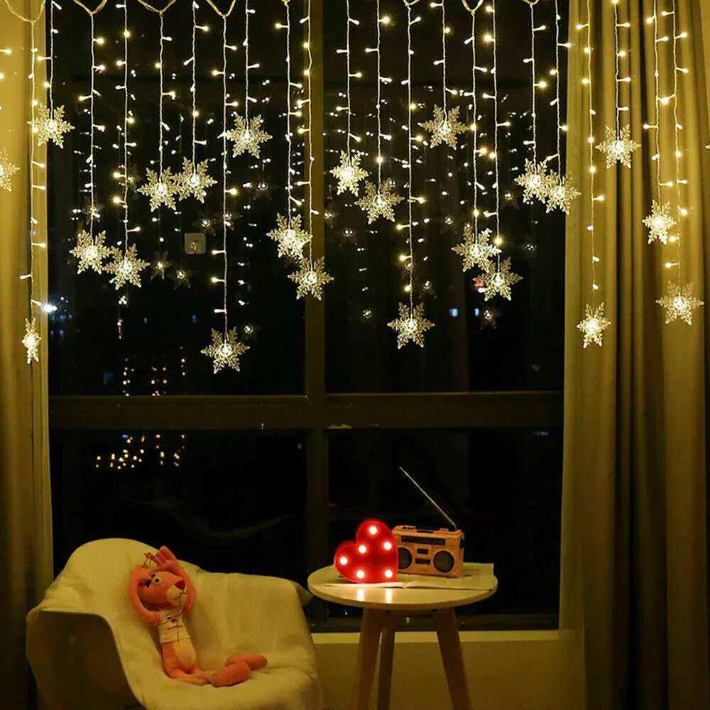 LED curtain lights hanging from a patio beam

