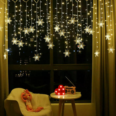 LED curtain lights hanging from a patio beam

