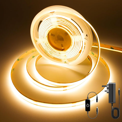 LED strip light with power adapter on a dark background