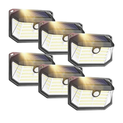 Backyard illuminated by solar wall-mounted light

