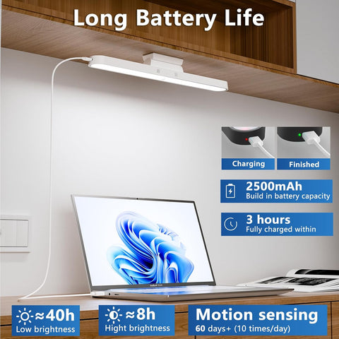 Lamp with laptop on desk, highlighting long battery life features.