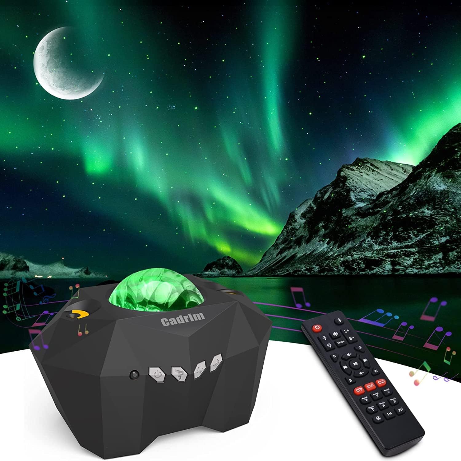 Laser projector with remote control in front of a scenic Northern Lights display