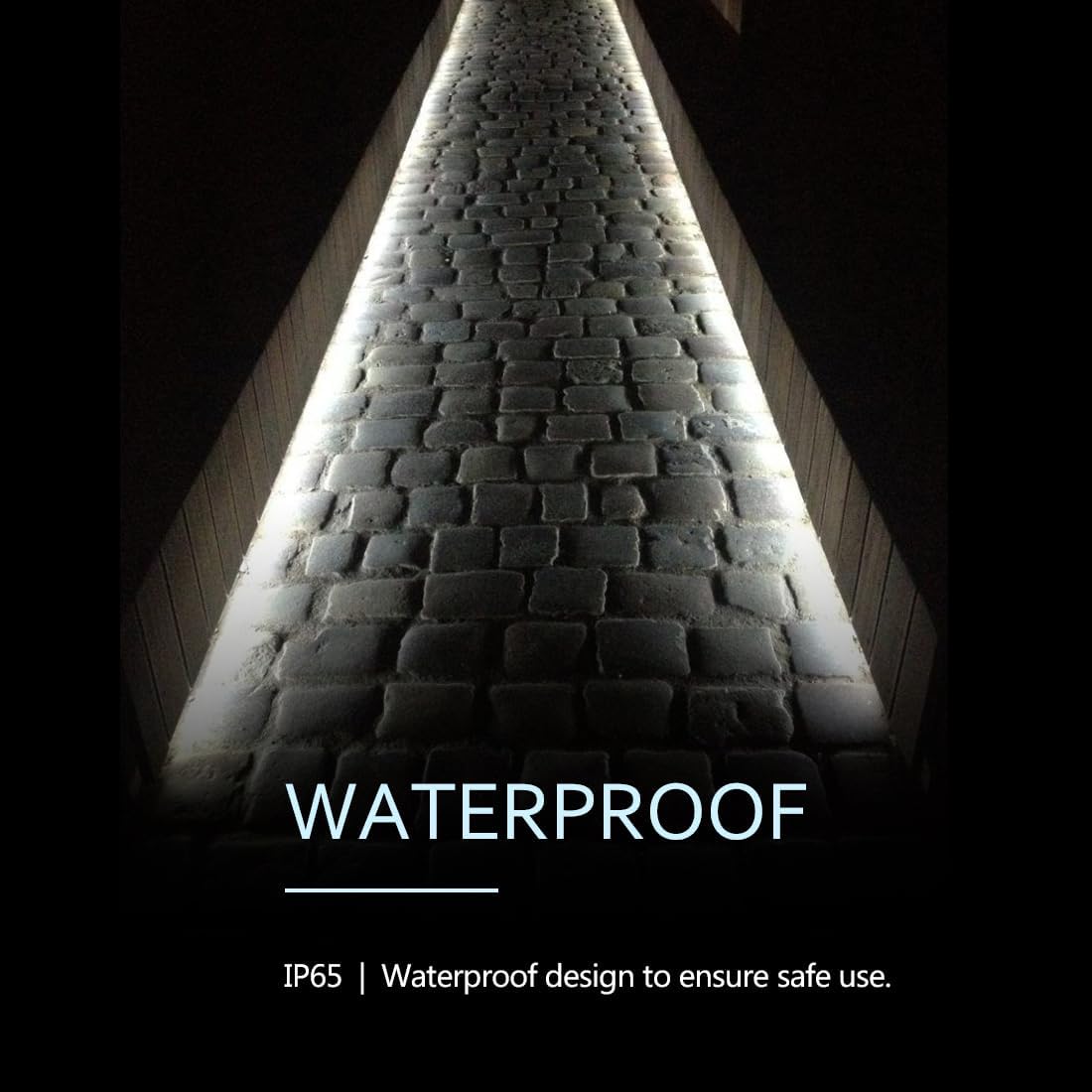 Light fixture with waterproof design text on a dark background