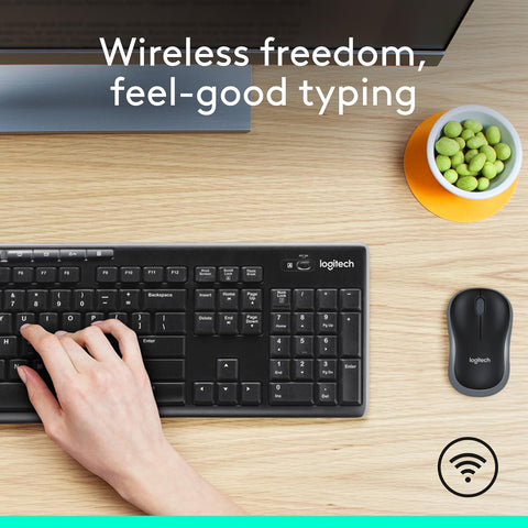 Logitech keyboard and mouse set on a desk with text 'Wireless freedom, feel-good typing'.