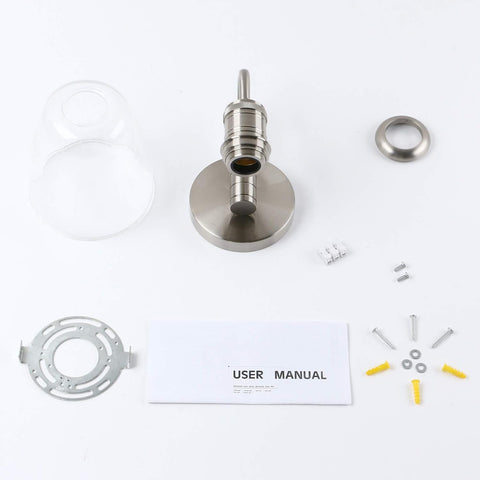 Metallic faucet assembly with parts and user manual on a white background