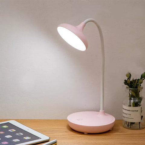 Lamp's USB charging port connected to a power source.


