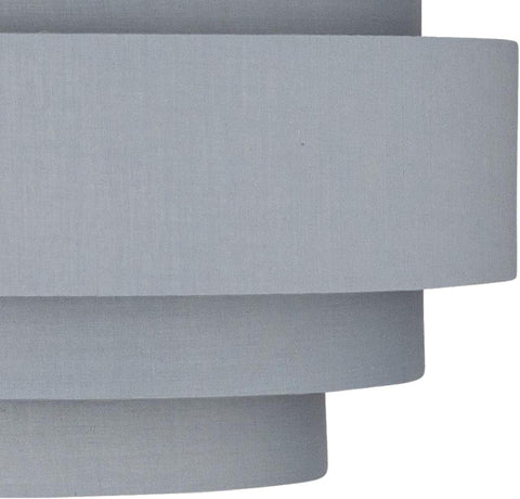 Layered grey ceiling shade casting ambient light