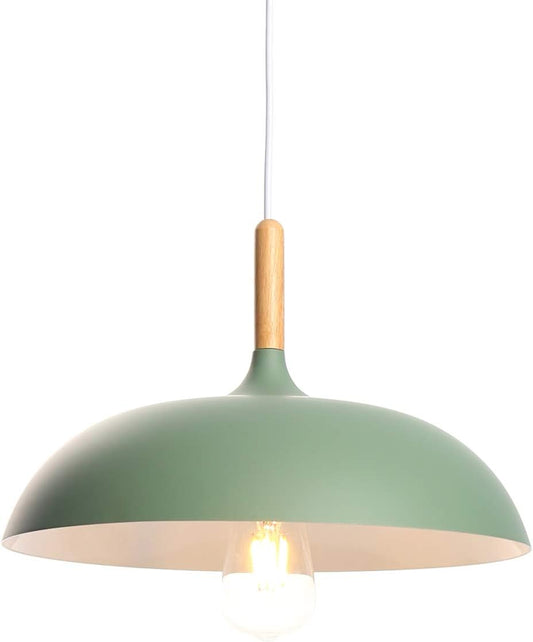 Modern industrial green pendant light hanging over a kitchen island.

