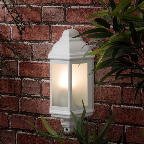 Bulkhead light installed on garden fence

