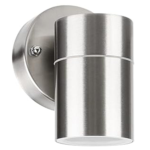 Modern stainless steel outdoor wall light mounted on a house exterior, providing warm illumination