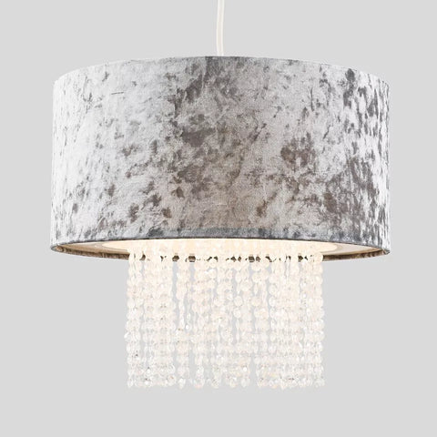 Grey velvet ceiling lampshade featuring clear decorative droplets


