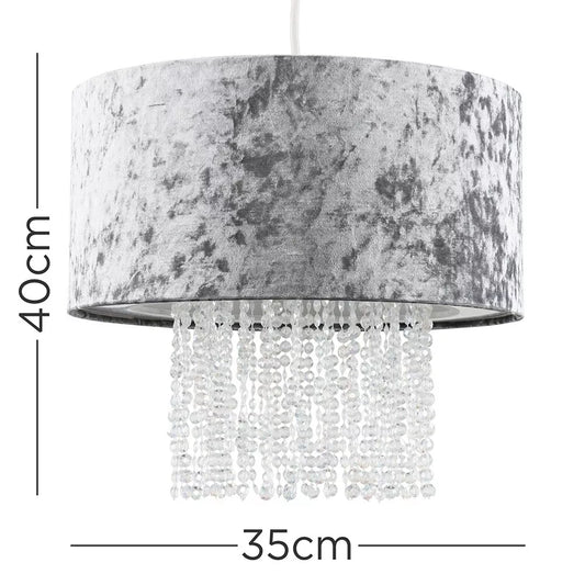 Gold velvet drum pendant light with hanging acrylic jewels

