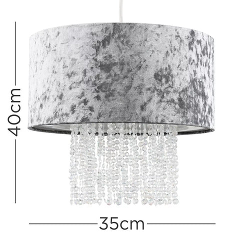 Gold velvet drum pendant light with hanging acrylic jewels

