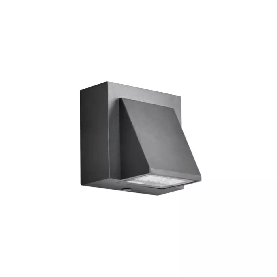 Minimalist LED wall sconce enhancing a contemporary living room interior