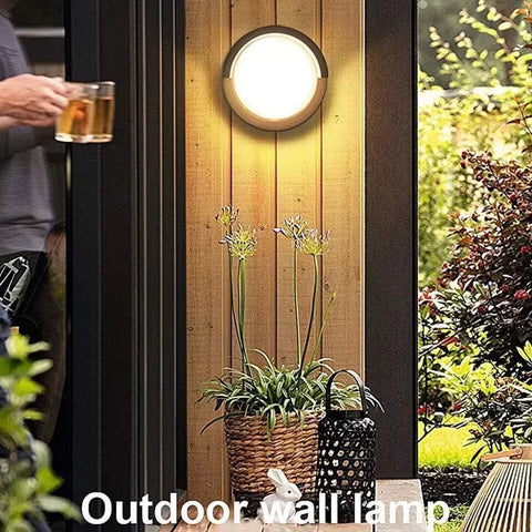  Weatherproof LED wall lamp mounted near a home entrance for added security