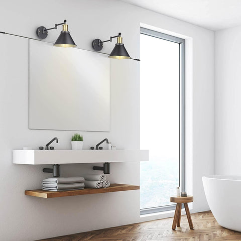 Modern bathroom with white vanity, mirror, and bathtub.