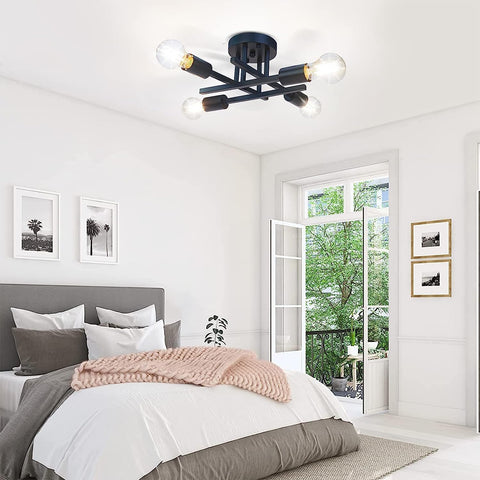 Modern bedroom with a ceiling light fixture, bed, and open door leading to a balcony.