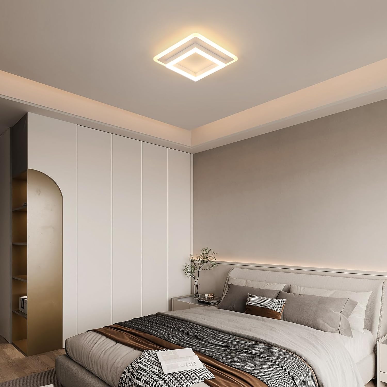 Modern bedroom with a ceiling light fixture, bed, and wardrobe.