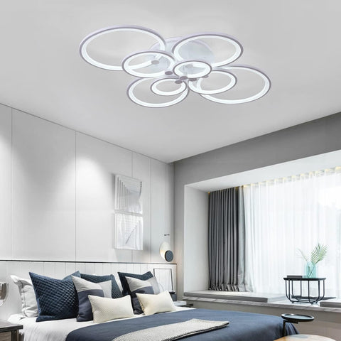 Modern bedroom with a ceiling light fixture
