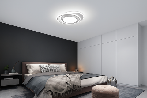 Modern bedroom with a ceiling light fixture