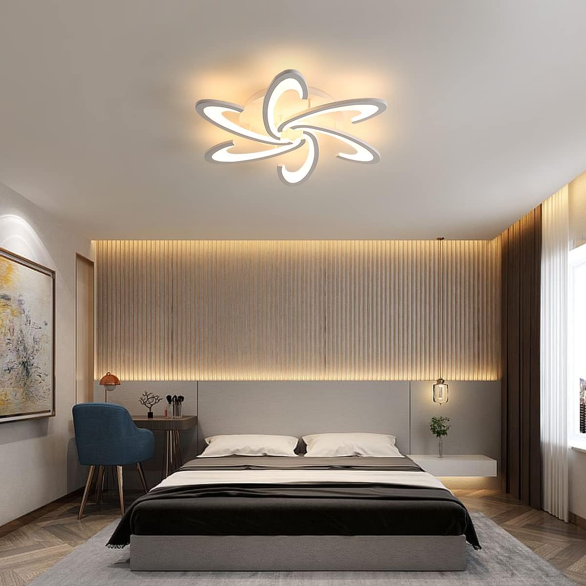 Modern bedroom with a decorative ceiling light fixture.